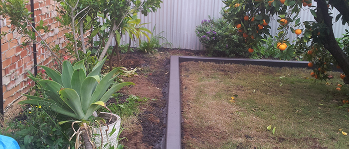 Concrete gutter and garden bed edging